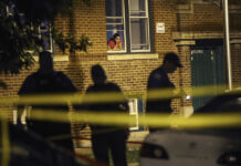 This slashed rates of violence by 70% in some areas. Could it work in SA? A woman watches from her window as police look for evidence after 20-year-old Carlos Barron was shot and killed in Chicago. The city is still very racially segregated and has high rates of violence.