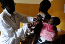 Good health without the fear of ruin Life: Pelagie Nyirambarushimana and her child Francine Niyonshuti at the Central University Hospital of Kigali. Rwanda has made drastic improvements in reducing child mortality.