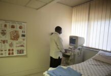 NHI pioneers new payment system Dr Meshack Mbokota at his private practice in Pretoria. GPs won't be able to work for the NHI from their surgeries.