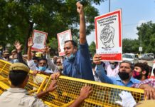 India arrests dozens of journalists in clampdown on critics of COVID-19 response Protesting journalists