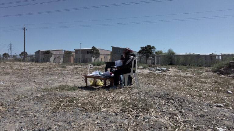 School of hard knocks: These children go to class in an open field
