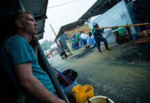 Ebola thrives on the scraps of war and blight Deluge: Caught in an afternoon rainstorm