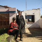 Jeanny Mbalati and her daughter Dinah outside their home in Soweto. It took them more than a year to get a loved one into a psychiatric hospital following his removal from Life Esidimeni facilities.