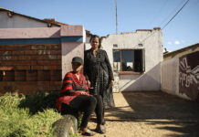 72 hours to care: The precarious road to psychiatric help Jeanny Mbalati and her daughter Dinah outside their home in Soweto. It took them more than a year to get a loved one into a psychiatric hospital following his removal from Life Esidimeni facilities.