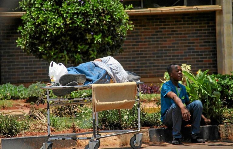 Long queues tell Zimbabwe’s story of economic crisis and failing healthcare
