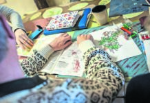 The promise and peril of ditching South Africa’s psychiatric hospitals Some lower functioning Care Haven Psychiatric Centre residents are guided through drawing and reading with a staff member as part of a daily programme to keep them active