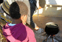 ‘If they are raped, then so what?’ Helping hands: Zethu Mqopi* and her daughter Sisanda*. Zethu has learnt to carry out household chores