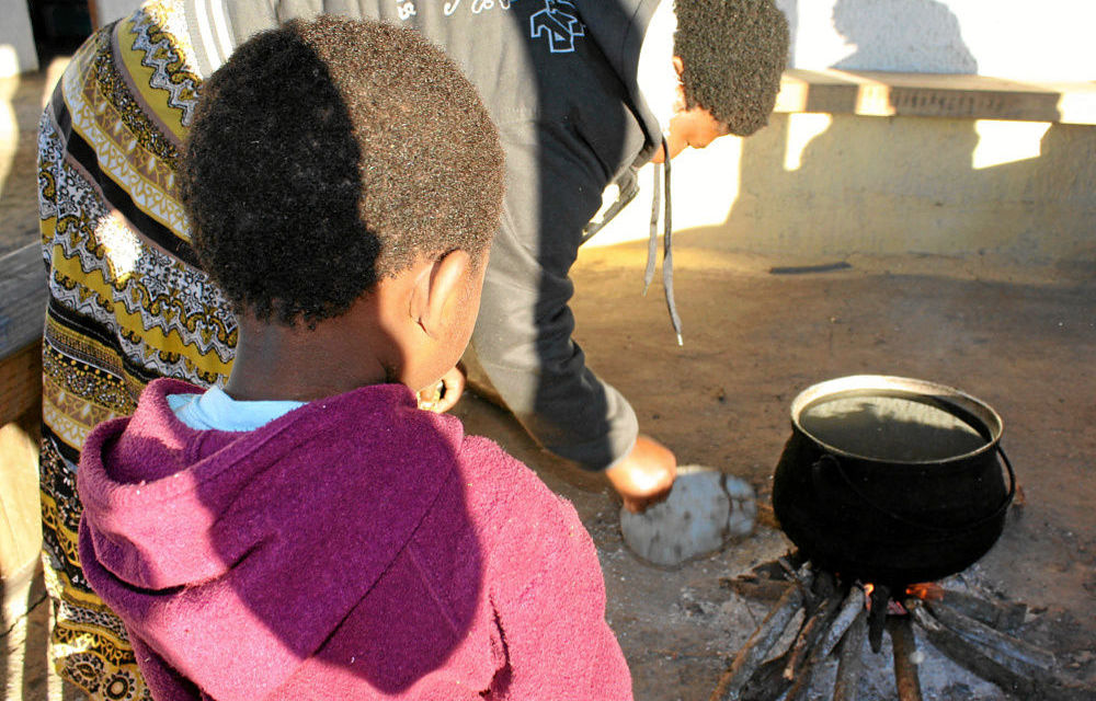 Helping hands: Zethu Mqopi* and her daughter Sisanda*. Zethu has learnt to carry out household chores