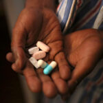 Nine-year-old Tumelo shows antiretrovirals.