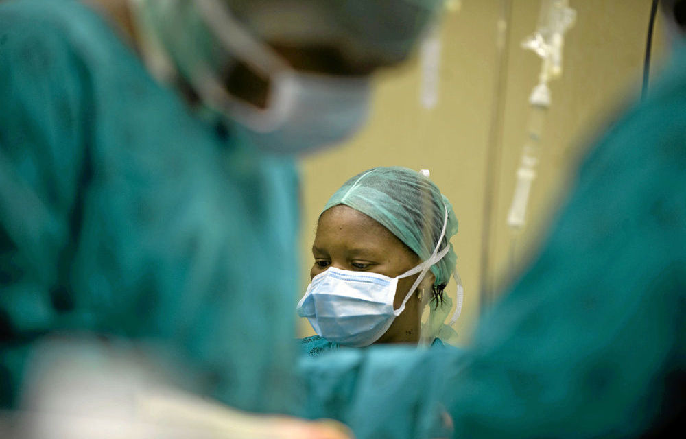 Doctors and nurses were held at gunpoint to stop giving patients treatment.