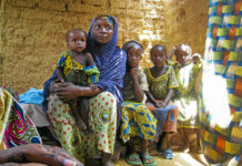 100-million young lives saved by aid A woman and her children in a village in Niger. A child born in 1960 had an 18% chance of dying before his or her fifth birthday. Today