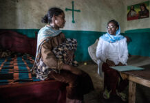 ‘If it wasn’t for them I would have died:’ How community health workers save lives A health extension worker visits Brahini Mokonen at her home